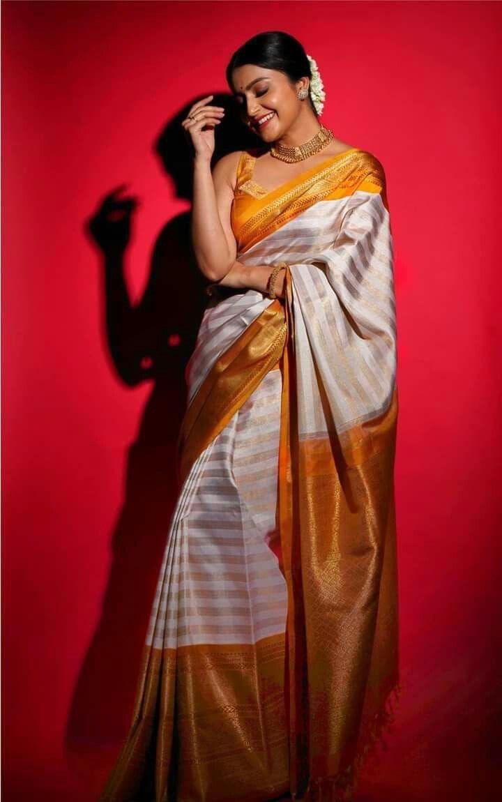 Golden Luxe Soft Lichi Silk Saree with Radiant Jacquard Accents & Exclusive Border Blouse